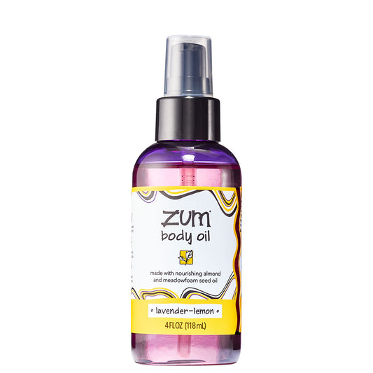 Cylinder bottle with pump top and cap that contains lavender-lemon scented body oil