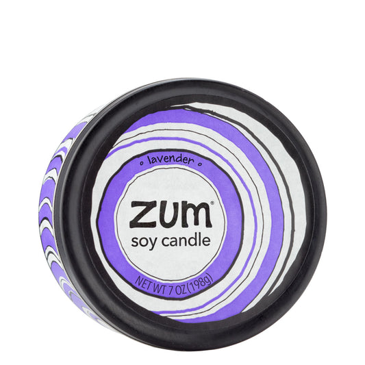Top view 7 oz Lavender Candle in a black tin with purple and white label that has circular designs.