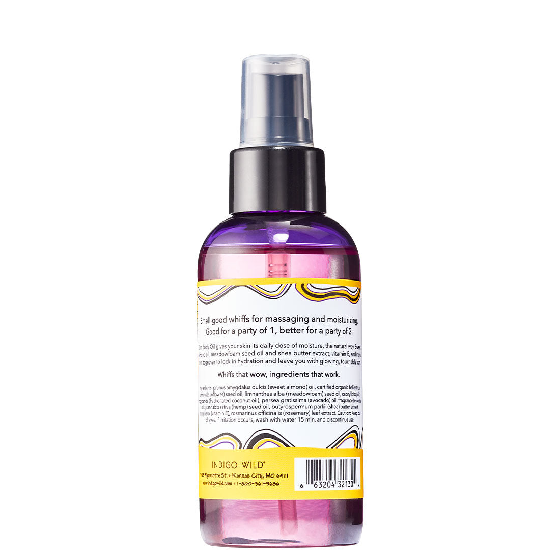 Back view of cylinder bottle with pump top and cap that contains lavender-lemon scented body oil