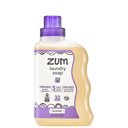 Plastic bottle with wavy edge and screw top cap containing lavender laundry soap liquid