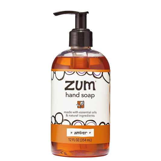 Amber Hand Soap in a pump bottle with black pump and white label.