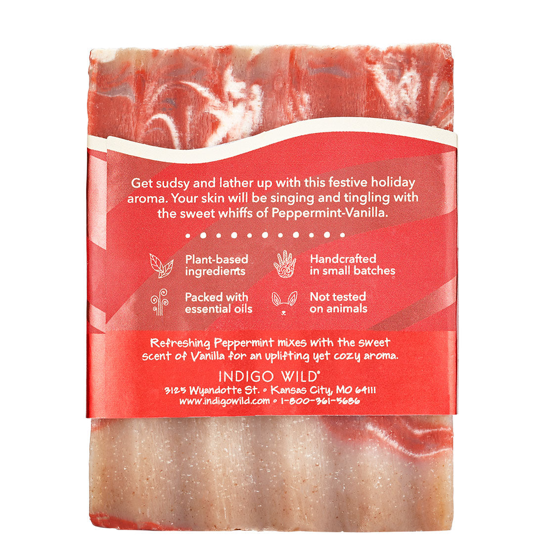 The back of a red and cream swirled soap bar with red label wrapped around.