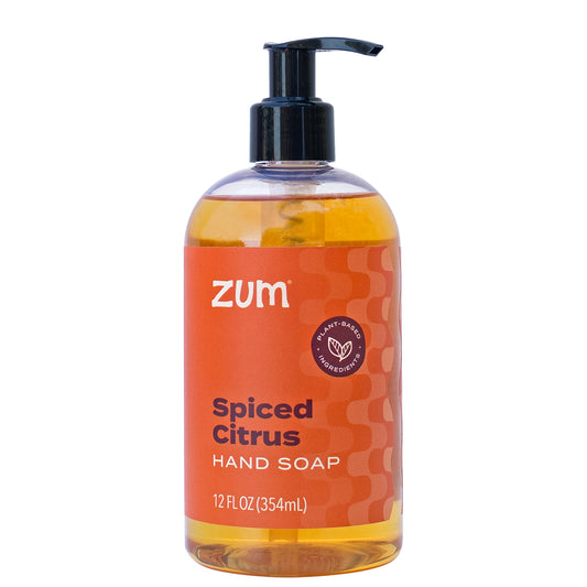 Bottle of Zum Spiced Citrus hand soap on a white background