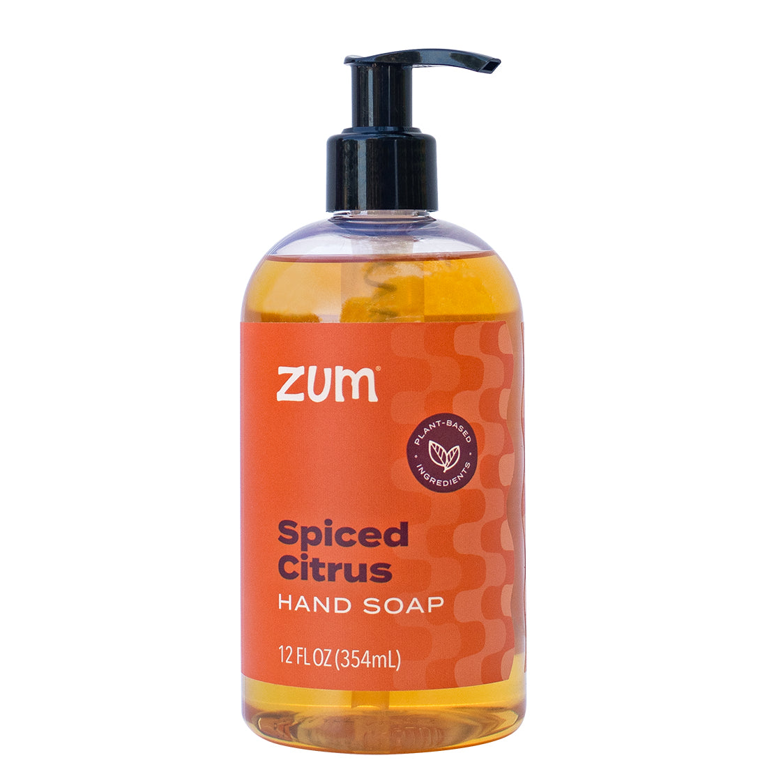 Bottle of Zum Spiced Citrus hand soap on a white background