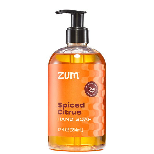 Bottle of Zum Spiced Citrus hand soap on a white background