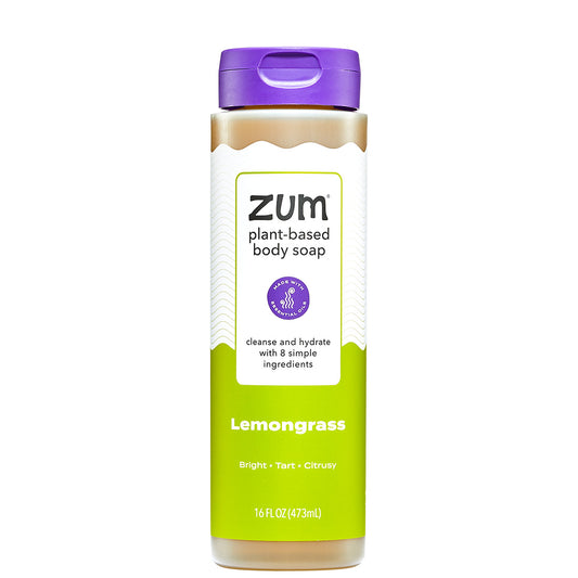 Zum plant-based body soap bottle with purple cap and green label on a white background