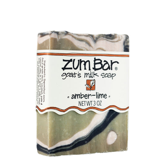 Green, white, and black swirled soap bar with white label.