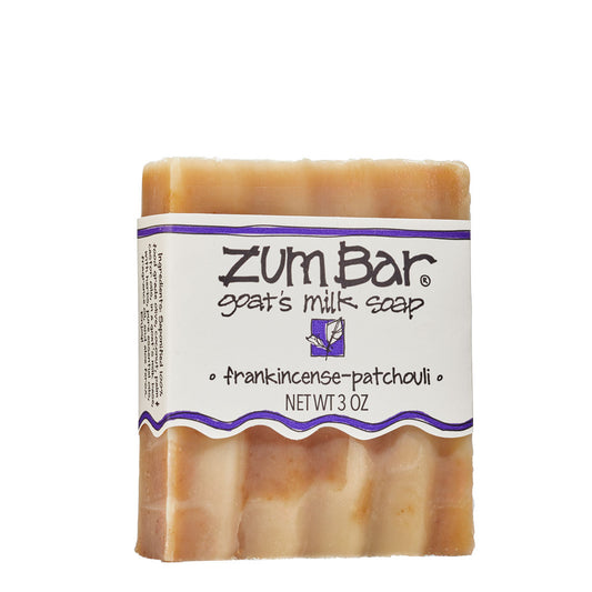 Labeled Frankincense-Patchouli scented Zum Bar Soap with varied brown coloring