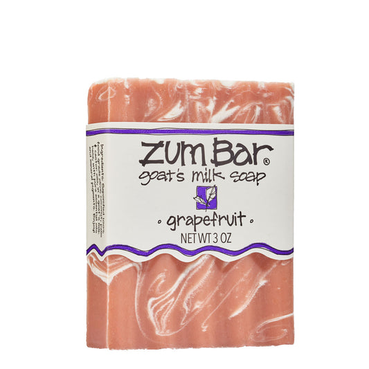 Labeled grapefruit scented Zum Bar Soap with pink and white colored swirls.