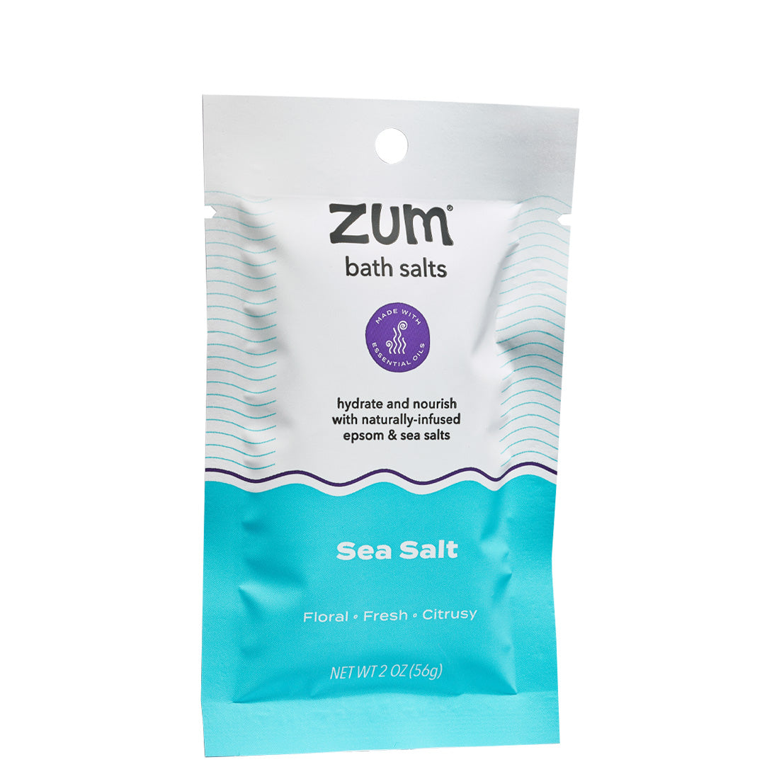Tearable packet with blue, black, and purple design containing Sea Salt scented bath salts.