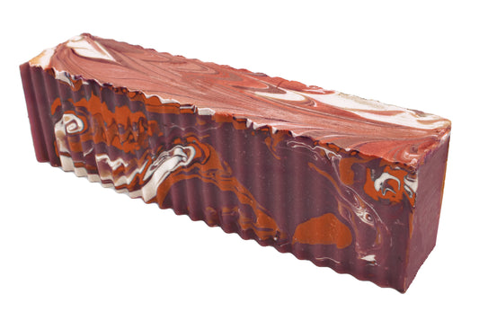 Marbled Soap Bar with brown and white swirled pattern on a white background