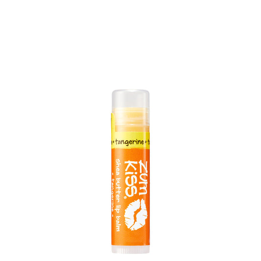 0.15 tube stick of Zumbo Kiss shea butter lip balm in the flavor Tangerine. Label colors are orange and yellow.