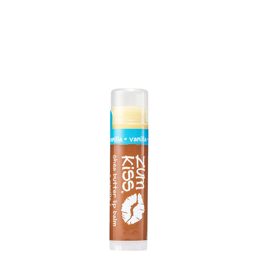 0.15 tube stick of Zumbo Kiss shea butter lip balm in the flavor Vanilla. Label colors are brown and blue.