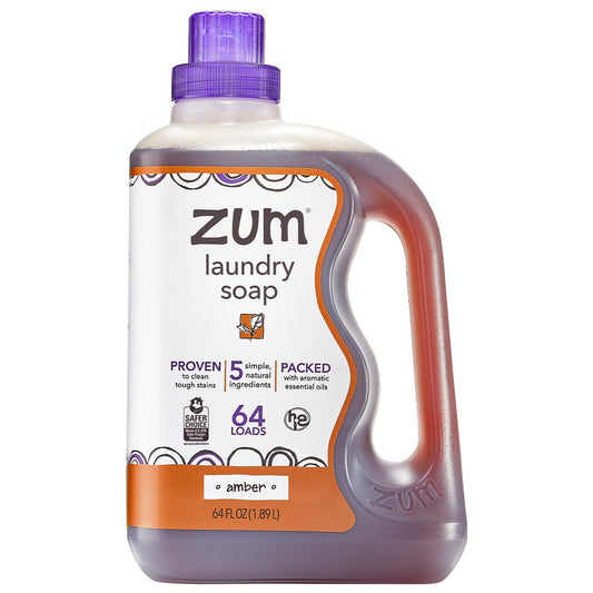 Liquid Amber laundry soap in a clear bottle with purple bap and white label.