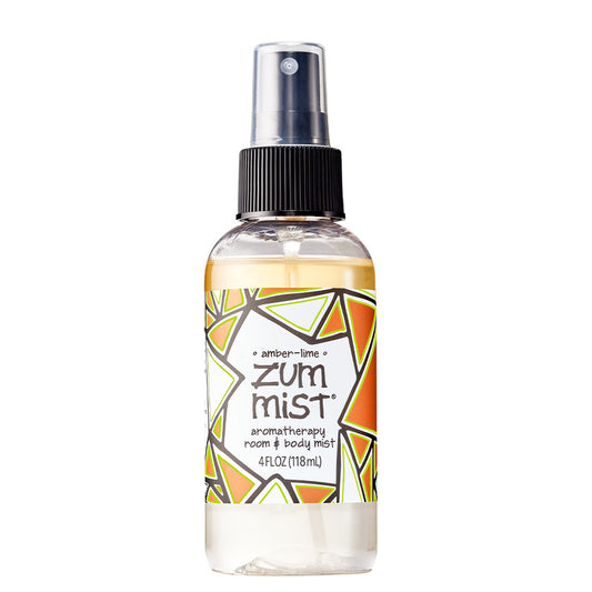 Amber-Lime Zum Spray in a clear bottle with black spray cap.