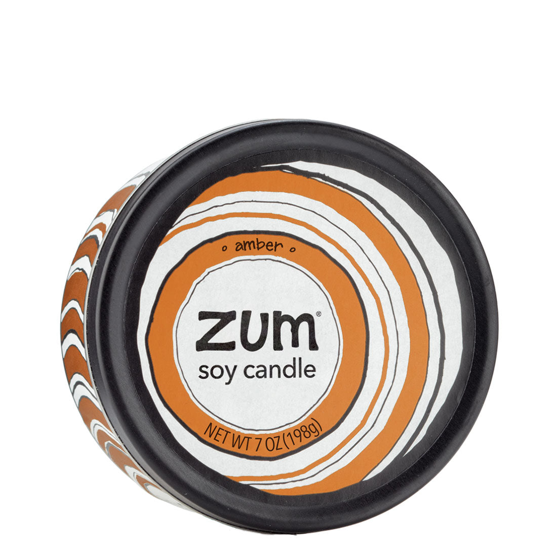 Top view 7 oz Amber Candle in a black tin with orangey brown and white label that has circular designs.