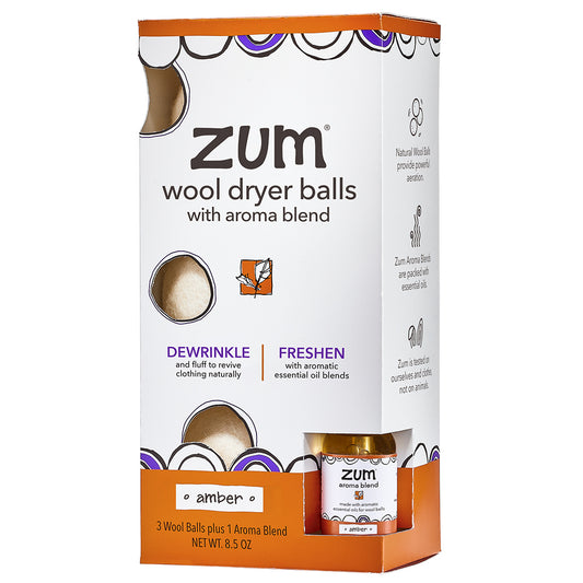 Amber Wool Dryer Ball Kit Box with three wool dryer balls inside and aroma blend on the side.